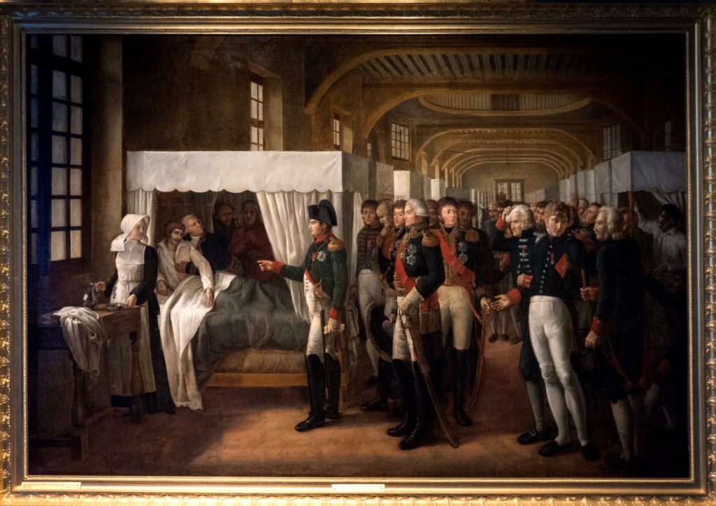 VERON : Napoléon aux Invalides (tableau 1809) Les batailles devenant plus indécises et plus sanglantes, l’Empereur n’est plus représenté glorieux mais compatissant pour les blessés